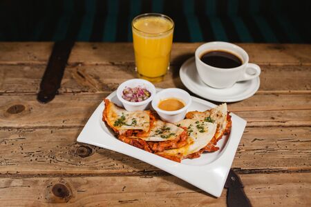 quesadillas and coffee with orange juice mexican breakfastの写真素材