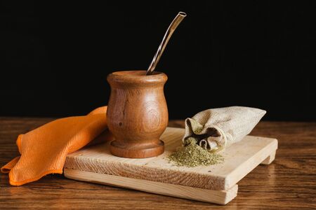 yerba mate tea traditional in Argentina on a black background