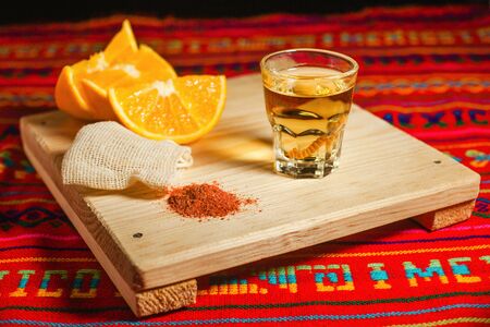 mezcal shot with chili salt and agave worm, mexican drink in mexicoの写真素材
