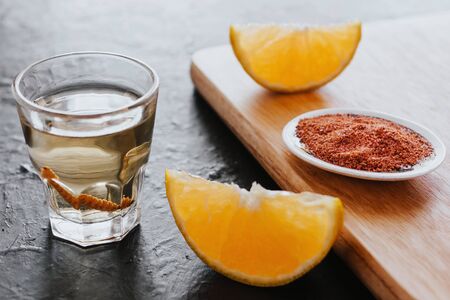 mezcal shot with chili salt and agave worm, mexican drink in mexicoの写真素材