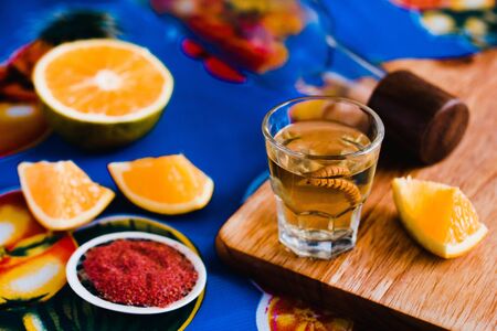mezcal shot with chili salt and agave worm, mexican drink in mexicoの写真素材