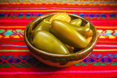 Jalapenos, jalapeÃ±o chili mexican food spicy chiles mexico city on clay bowlの写真素材