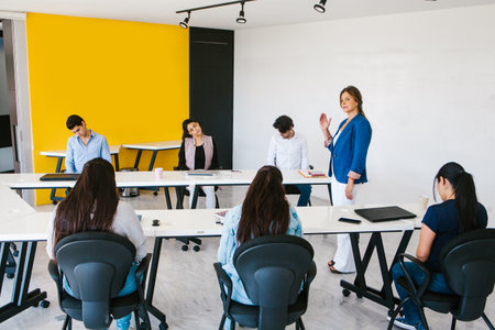 latin business people meditating and doing yoga in office in Mexico city