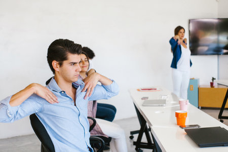 latin business people meditating and doing yoga in office in Mexico cityの写真素材