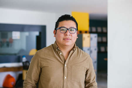 plus size latin Man portrait looking to camera outside office in Mexico cityの写真素材