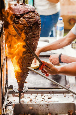 cooking Mexican tacos with beef, traditional street food in Mexico cityの写真素材
