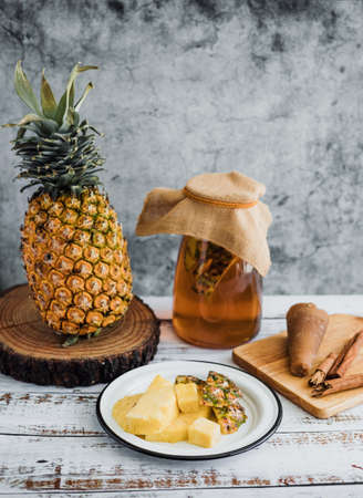 ingredients for Tepache Mexican fermented beverage made with pineapple, panela and cinnamon traditional in Mexico cityの写真素材