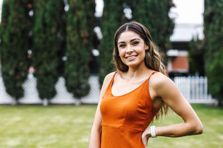 portrait of young Latin woman smiling in park in Mexico Latin Americaの写真素材