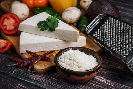 Mexican white Cotija cheese, tequila shot with fresh ingredients in Mexico Latin Americaの写真素材