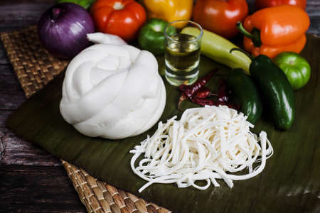 Mexican Oaxaca cheese with fresh ingredients in Mexico Latin Americaの写真素材