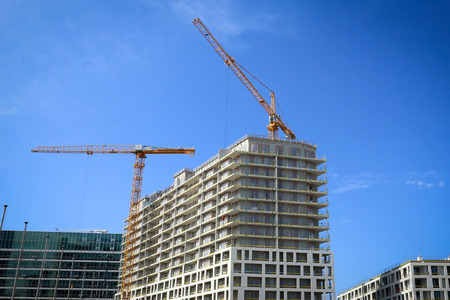 New houses under construction on a building site