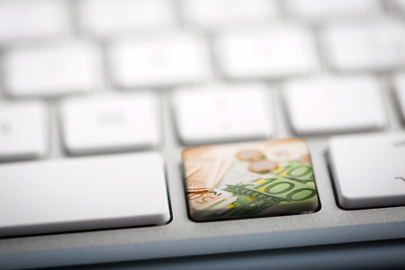 Euro Money on Metallic Keyboardの写真素材