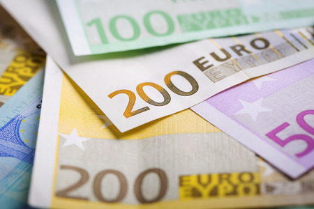 Euro money: closeup of banknotes and coins