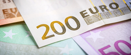 Euro money: closeup of banknotes and coinsの写真素材
