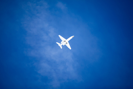 Airplane in the blue sky