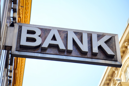 Old 'Bank' sign on a building exterior.の写真素材