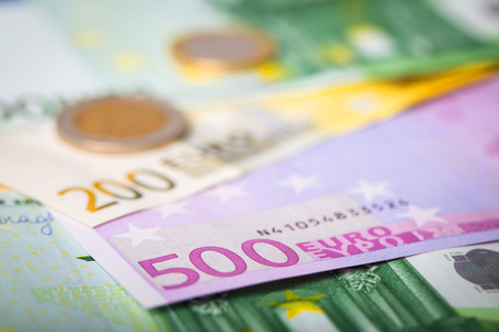 Euro money: closeup of banknotes and coinsの写真素材