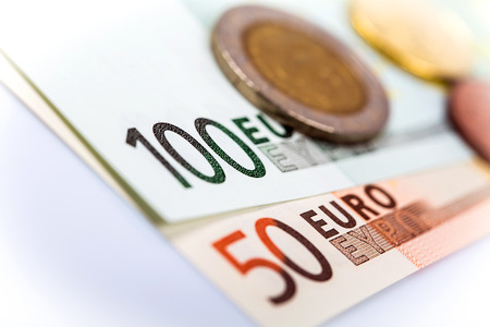 Euro money: closeup of banknotes and coins