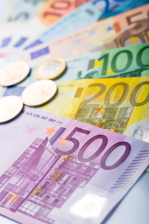 Euro money: closeup of banknotes and coinsの写真素材