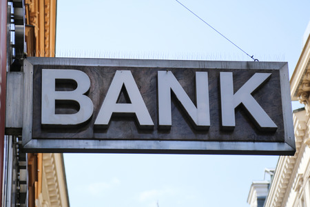 Old 'Bank' sign on a building exterior.の写真素材