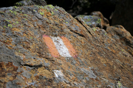 Trail marker for hikers in a summer dayの写真素材