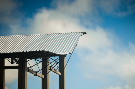 Aluminum metal roof structure with blue sky