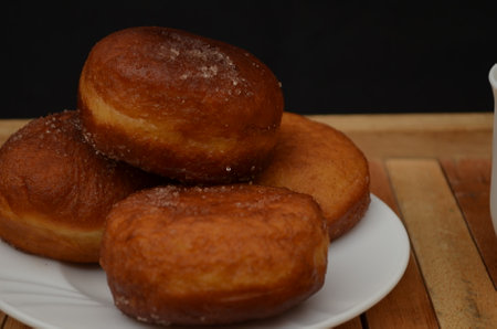 Beautiful handmade donuts covered in chocolate and sugar
