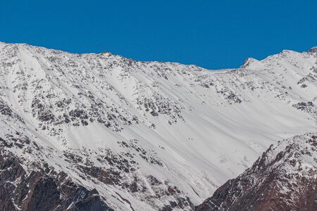 Natural Monument El Morado, Central Andes of Chile. A snowy mountain slopes