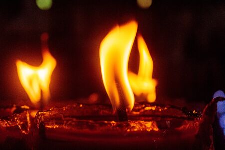 Red candles brightening at night