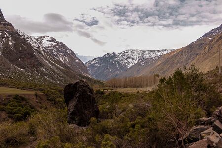 mountain landscape in Lo ValdÃ©s Valley, CajÃ³n del Maipo, Central Andes of Chile.