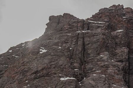 Snowy rocky mountain in Lo ValdÃ©s Valley, CajÃ³n del Maipo, Central Andes of Chile.の写真素材