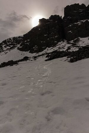Snowy rocky mountain in Lo ValdÃ©s Valley, CajÃ³n del Maipo, Central Andes of Chile.