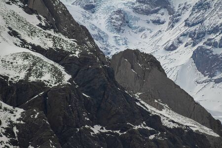 Closeup of a glacier, snow and rocks of San JosÃ© Vulcano viewed from Lo ValdÃ©s Valley, CajÃ³n del Maipo, Central Andes of Chile.の写真素材