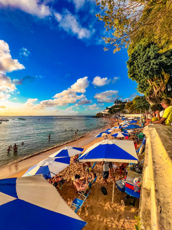 Unidentified people relax on the beachの写真素材