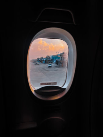 View from airplane window at sunset.の写真素材
