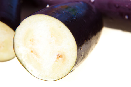 Aubergine closeup isolated on white backgroundの写真素材