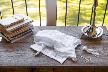 individual knitting on the desk next to the window - sewing concept