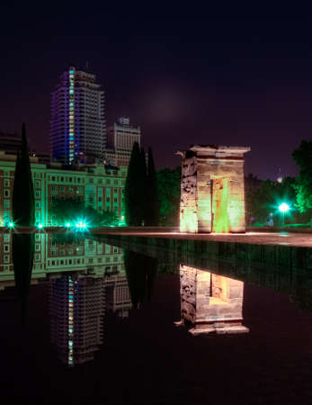 Temple of Debod at night. Reflection in water.の写真素材