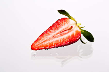 Strawberry on white background with water drops. Isolated.の写真素材