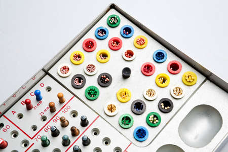 Close up view of a board game with buttons and buttons on a white background