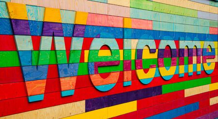 Wooden multicolor welcome sign in perspectiveの写真素材