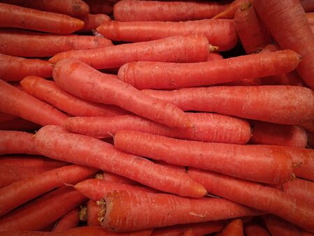 portion of fresh raw carrotsの写真素材