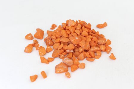 A pile of orange stones