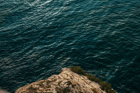 a view of a rock in the seaの写真素材