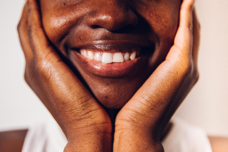 black woman showing her teethの写真素材