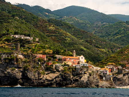 little village on steep hill in italy coast