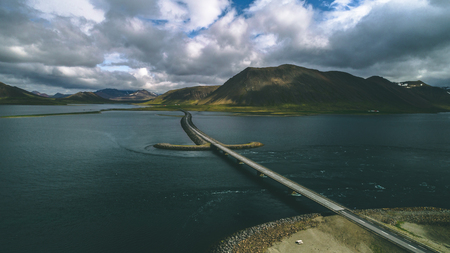 aerial view of road 1 in iceland, bridge over the seaの写真素材