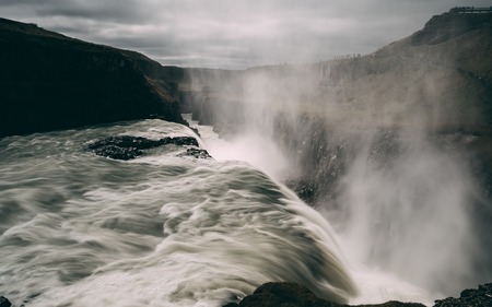 gulfoss waterfall in iceland with smooth water long time exposure rockyの写真素材