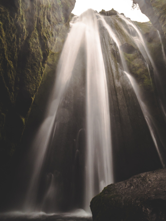 gljufrabui secret waterfall in iceland smooth long time exposure mossy rocksの写真素材