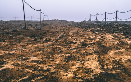 path in iceland covered in fog. looks like mars foggyの写真素材